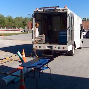 Sewer Department demonstrating the use of the Tv inspection truck during Open House. 