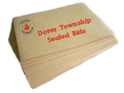 Stack of manilla envelopes with red text, "Dover Township Sealed Bids"