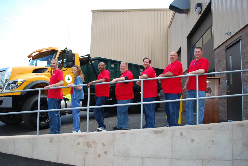 Dover Township WWTP Group Picture wearing red shirts.