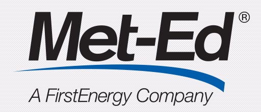 White background with black text, underlined by blue streak, "Met-Ed". Plain black text below that, "a FirstEnergy Company"