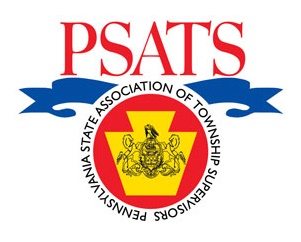 red text at top of logo, "PSATS". Blue ribbon underneath the red text. Black text circling the yellow keystone crest of PA, "Pennsylvania State Association of Township Supervisors"