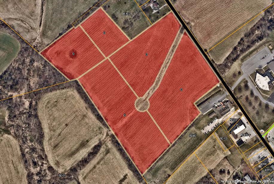 aerial map with the Carlisle Rd Priority Parcels colored in red. Click to the map picture to be redirected to the Dover Township interactive zoning map.