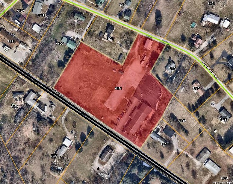 aerial map with 6421 Carlisle Rd Priority Parcel colored in red. Click to the map picture to be redirected to the Dover Township interactive zoning map.