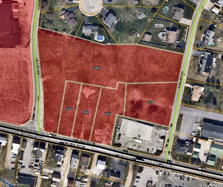 aerial map with the Newberry Plaza Priority Parcels colored in red. Click to the map picture to be redirected to the Dover Township interactive zoning map.