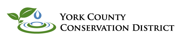 on the left side of the logo is a green plant with three leaves and next to it is a circle representing the splashing of a drop of water. Above that is a blue drop of water. To the right of this image is black text, "York County Conservation District"