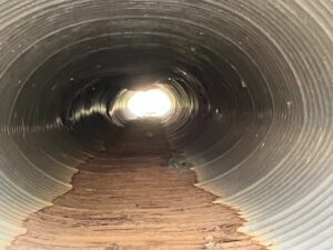 Picture taken inside a damaged stormwater pipe.